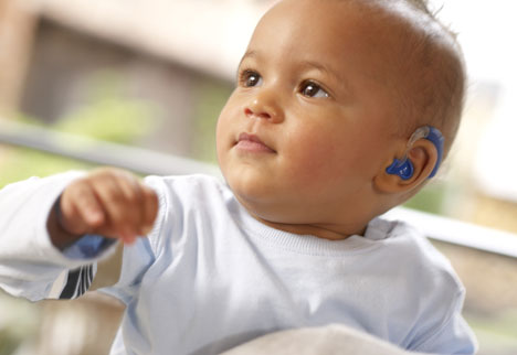 Baby-with-Hearing-Aid-Digitalhearingcare.org .uk_