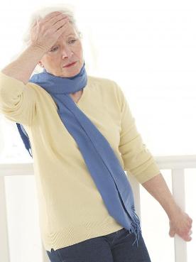 elderly-woman-in-blue-scarf-with-dizziness
